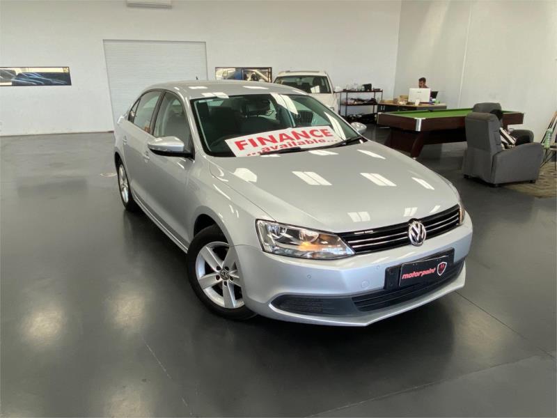 >2014 VOLKSWAGEN JETTA 4D SEDAN 118 TSI COMFORTLINE 1KM MY14